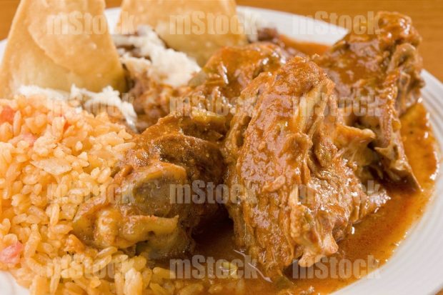 Cabrito en salsa con arroz