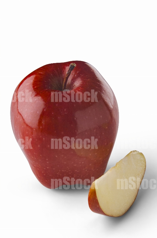 Manzana roja cortada y rodaja