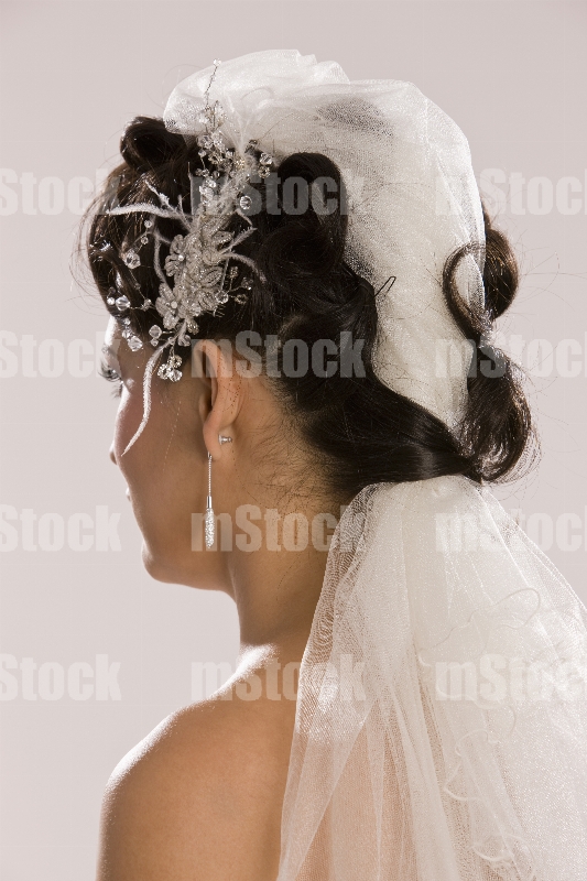 Velo de novia y tocado